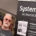 Trois membres du Systema Centre au stand du club, place du Martroi, devant le kakémono présentant l’art martial et la self-défense